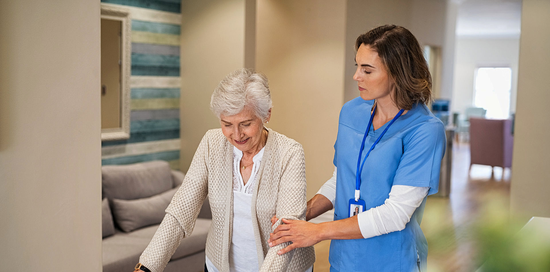 Nurse is guiding the senior woman to talk